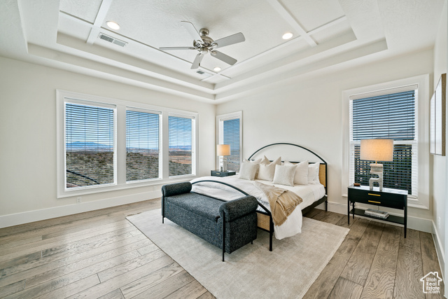 6026 Zen Trail Way St. George, UT 84790 - Photo 11 of 41 Bedroom featuring a tray ceiling, recessed lighting, hardwood / wood-style floors, and ceiling fan