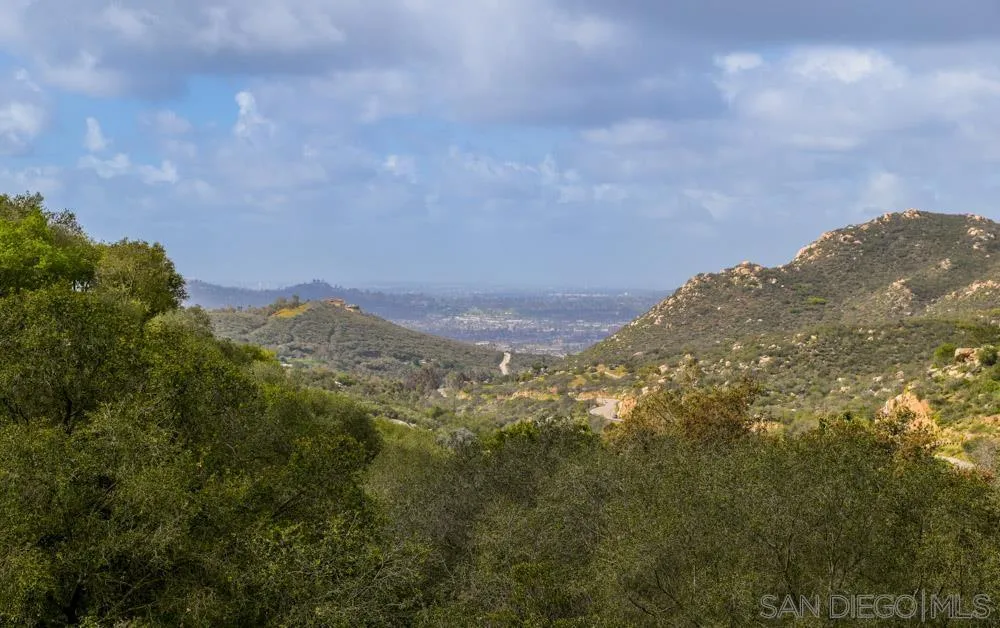 1105 Hamlet Drive El Cajon, CA 92021 - Photo 23 of 26 a view of a large building in the middle of a house