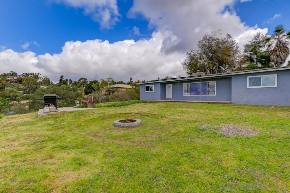 1105 Hamlet Drive El Cajon, CA 92021 - Photo 26 of 26 a view of a house with a yard