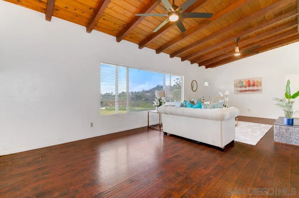 1105 Hamlet Drive El Cajon, CA 92021 - Photo 9 of 26 a living room with furniture and a large window