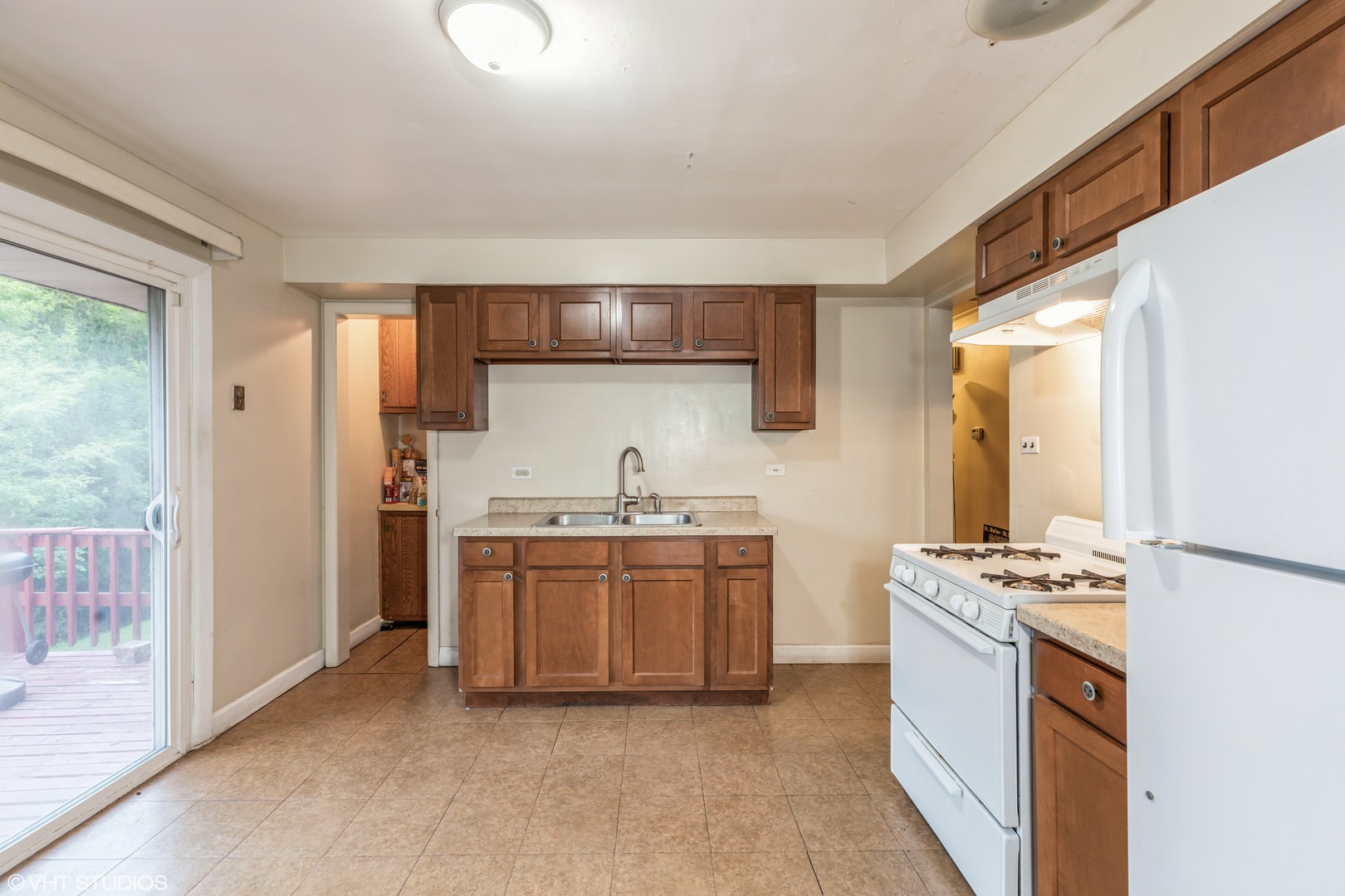 828 Exmoor Road Olympia Fields, IL 60461 - Photo 4 of 9 a kitchen with stainless steel appliances granite countertop a stove a sink and a refrigerator