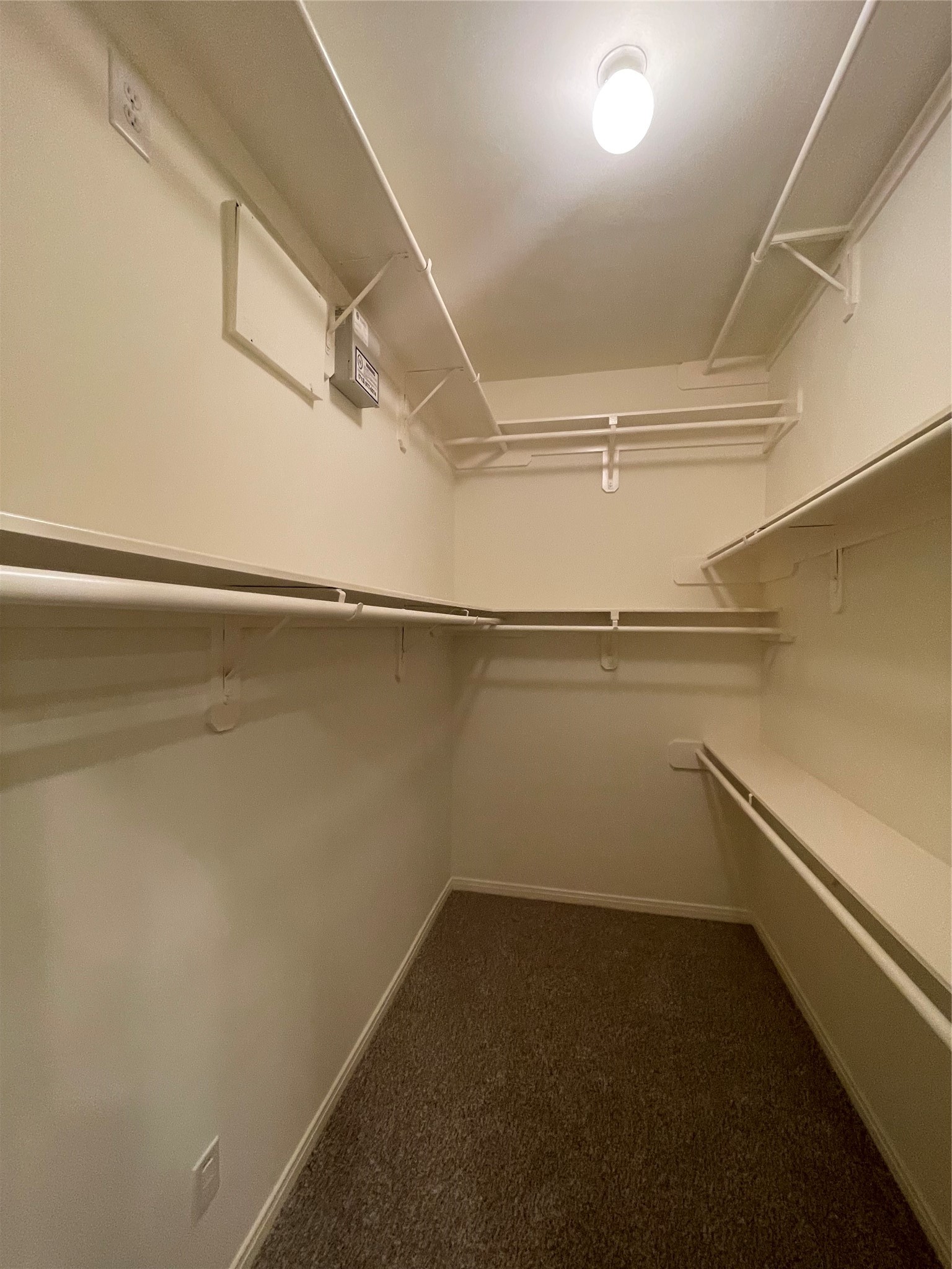 1040 La Rue Street Houston, TX 77019 - Photo 25 of 29 a view of a room with racks on the wall