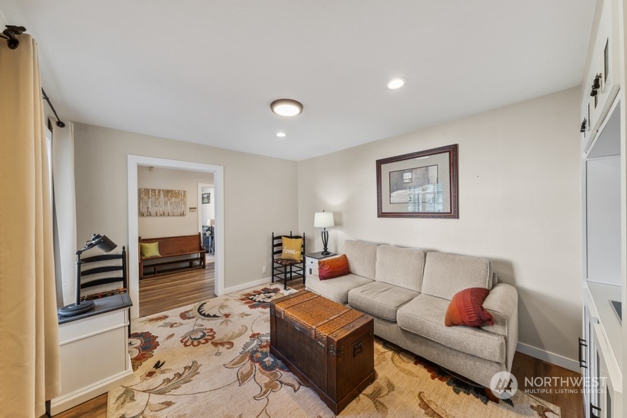 2007 Park Enumclaw Wa 98022 Enumclaw, WA 98022 - Photo 10 of 34 a living room with furniture and a flat screen tv