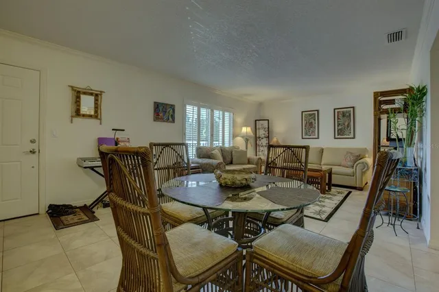 a view of a dining room with furniture
