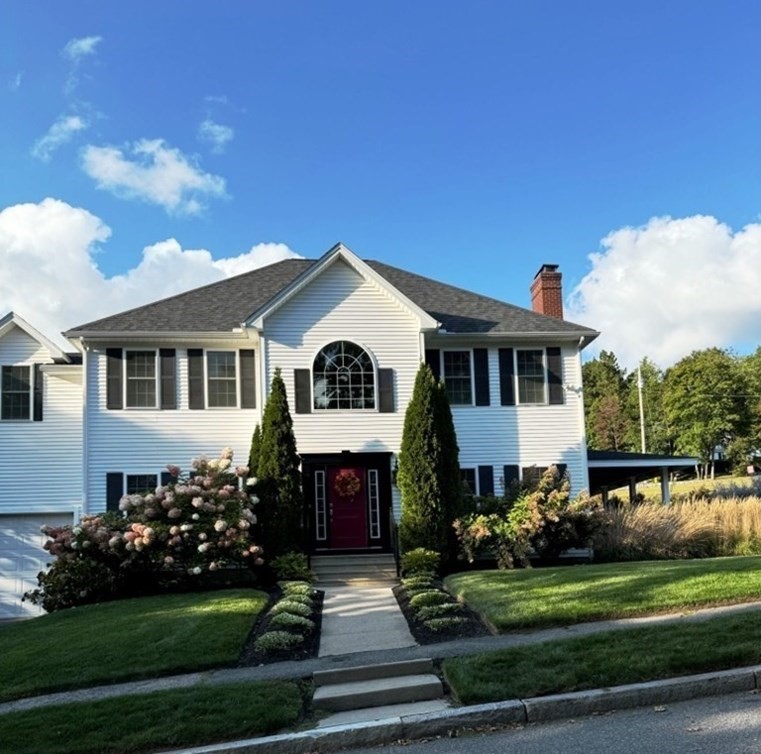 3 Bancroft Tower Road Worcester, MA 01609 - Photo 2 of 42 a front view of a house with a garden