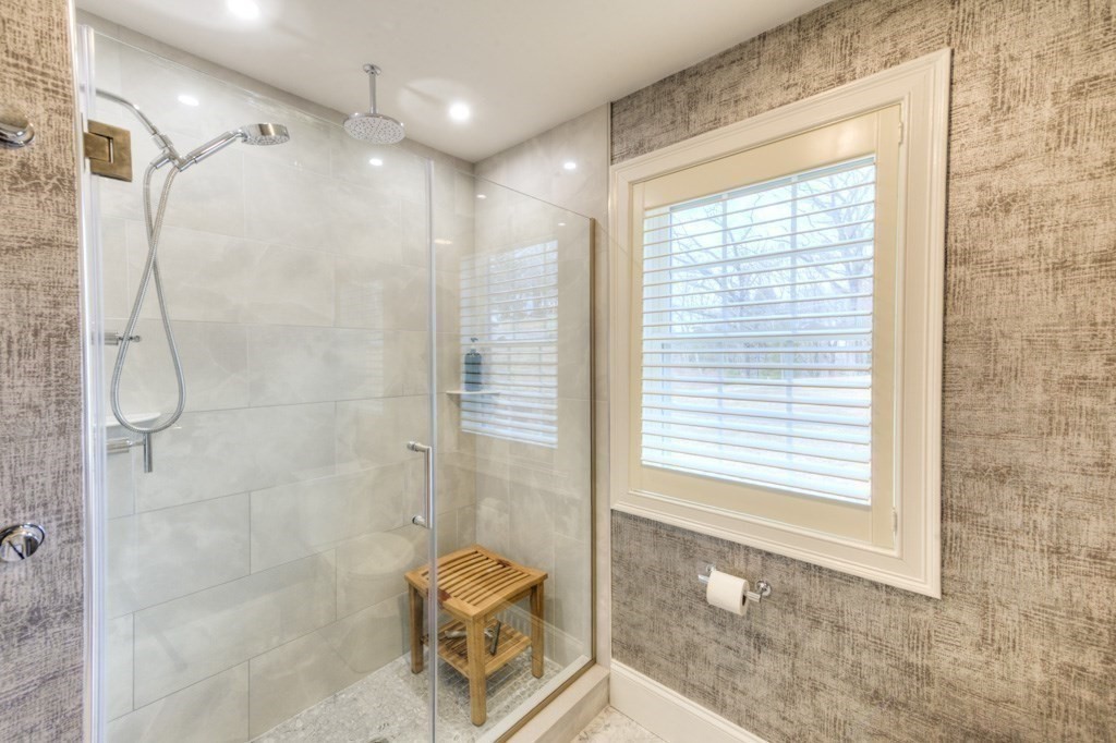 3 Bancroft Tower Road Worcester, MA 01609 - Photo 21 of 42 a bathroom with a shower and a natural light