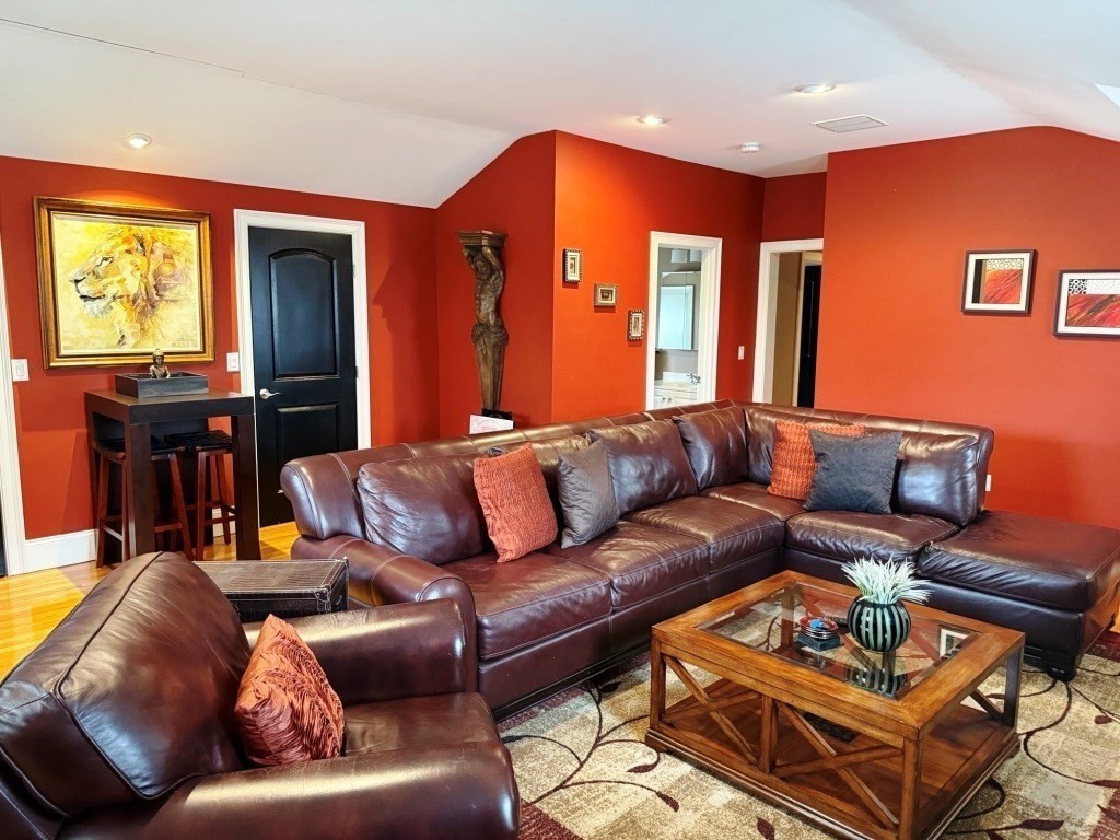3 Bancroft Tower Road Worcester, MA 01609 - Photo 32 of 42 a living room with furniture a air conditioner and a window