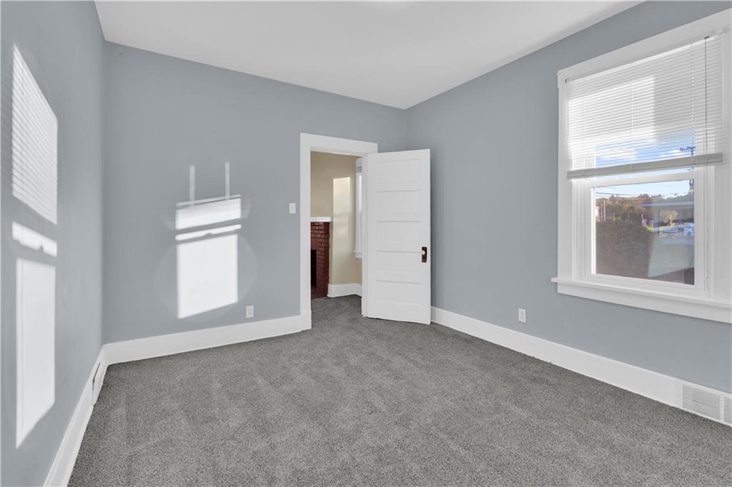 2071 Brodhead Road Aliquippa, PA 15001 - Photo 13 of 30 an empty room with windows and closet