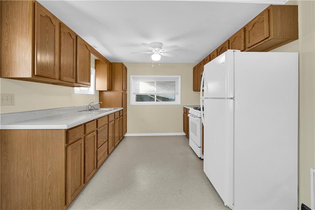 2071 Brodhead Road Aliquippa, PA 15001 - Photo 15 of 30 a view of a kitchen with electric appliances