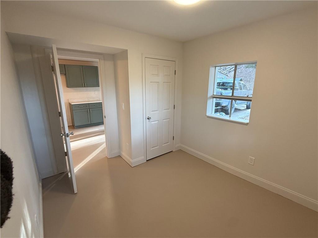 456 Poverty Road, Unit B Murrayville, GA 30564 - Photo 12 of 21 a view of an empty room with a window