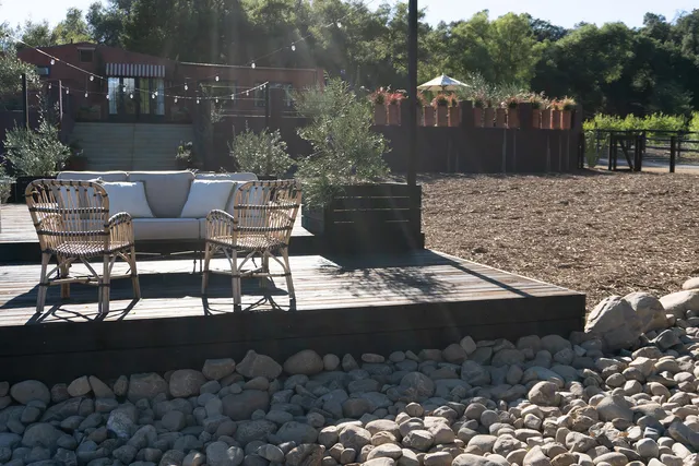 a outdoor living space with furniture and city view