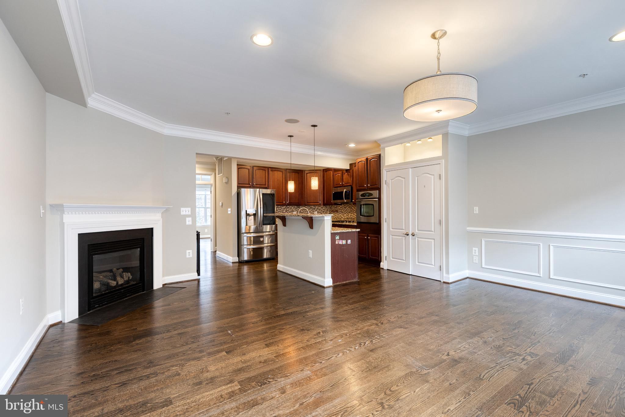 3307 Fait Avenue Baltimore, MD 21224 - Photo 9 of 26 a view of a kitchen with a sink and a fireplace
