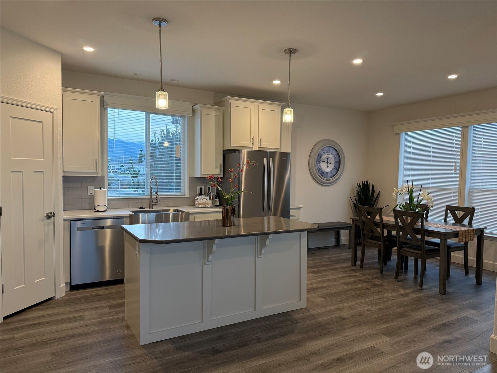 Undisclosed Address Sequim, WA 98382 - Photo 4 of 10 a large kitchen with a table and chairs