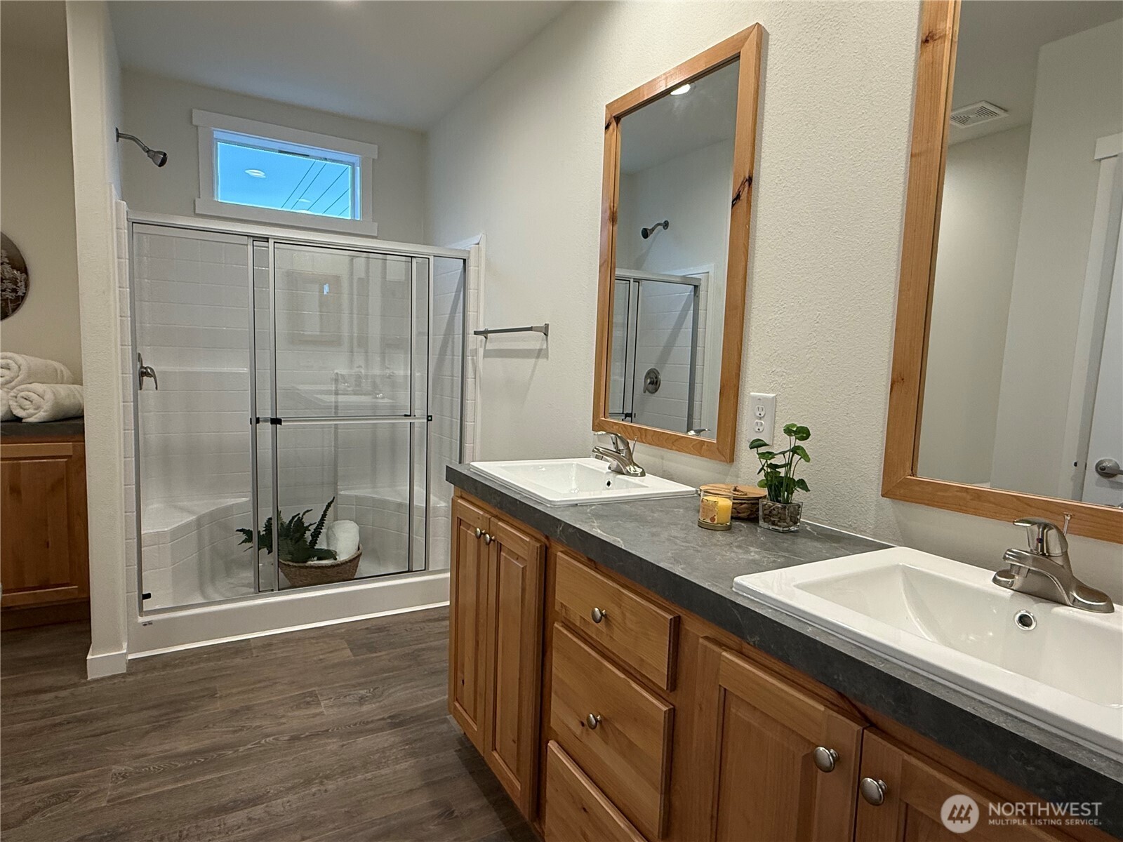 Undisclosed Address Sequim, WA 98382 - Photo 6 of 11 a bathroom with a granite countertop sink mirror and shower