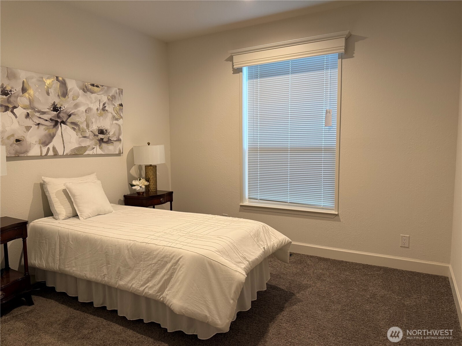 Undisclosed Address Sequim, WA 98382 - Photo 8 of 10 a bedroom with a bed and a window