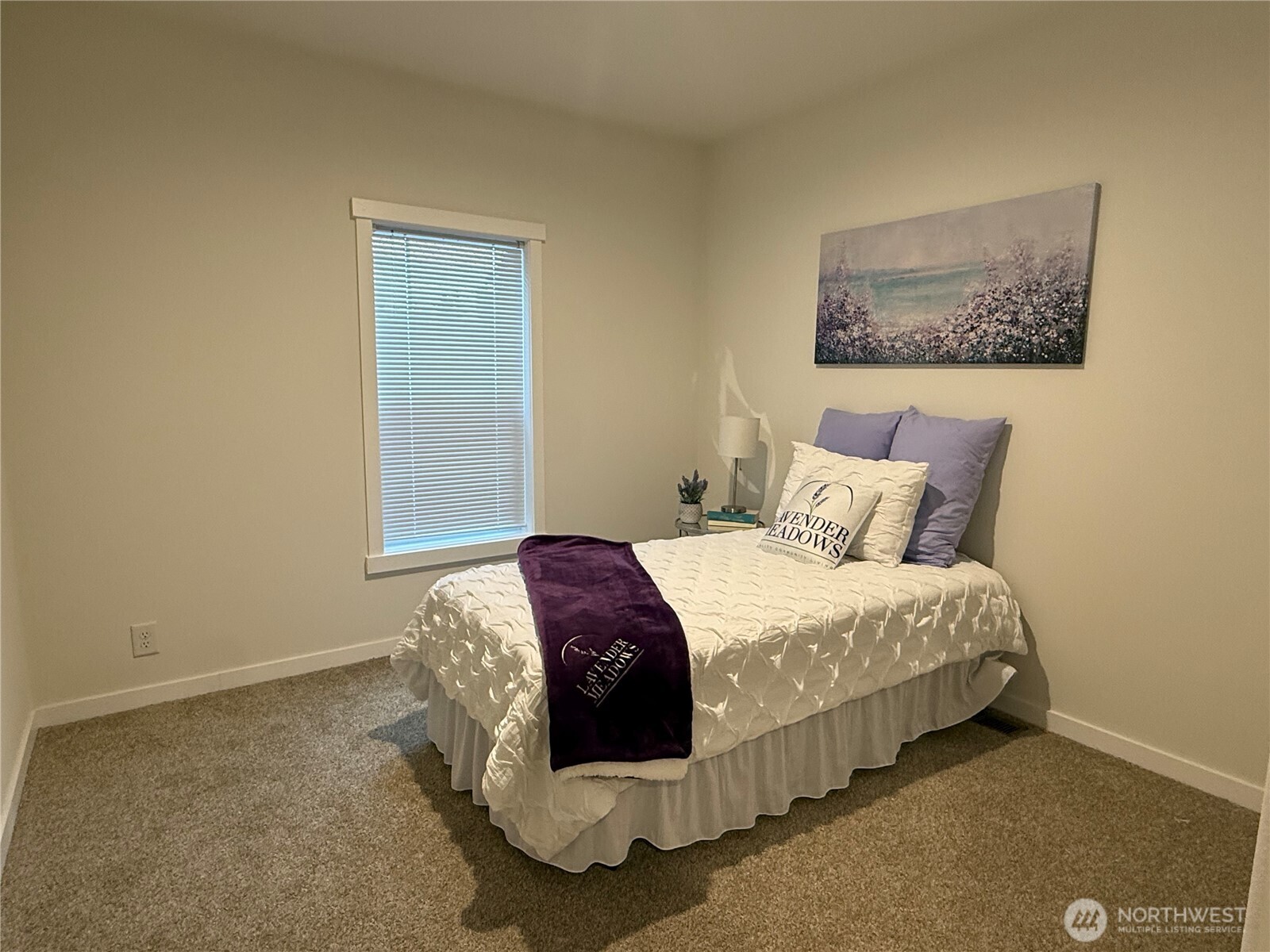 Undisclosed Address Sequim, WA 98382 - Photo 9 of 11 a bedroom with a bed and a window