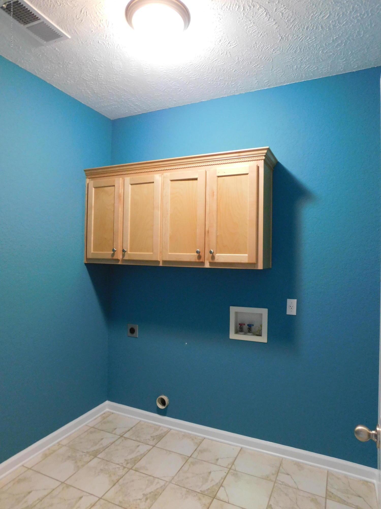 6103 Coleman Road Olive Branch, MS 38654 - Photo 34 of 42 laundry room
