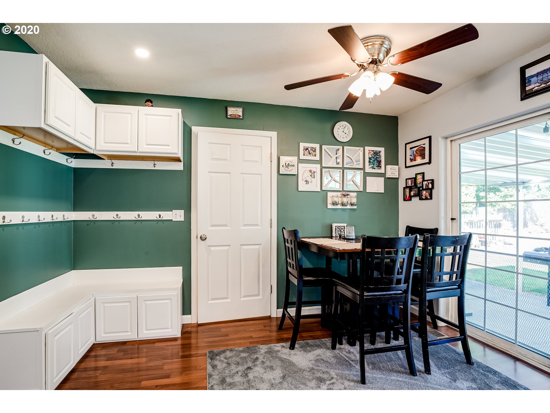 591 68th Place Springfield, OR 97478 - Photo 12 of 31 a view of a dining room with furniture and chandelier