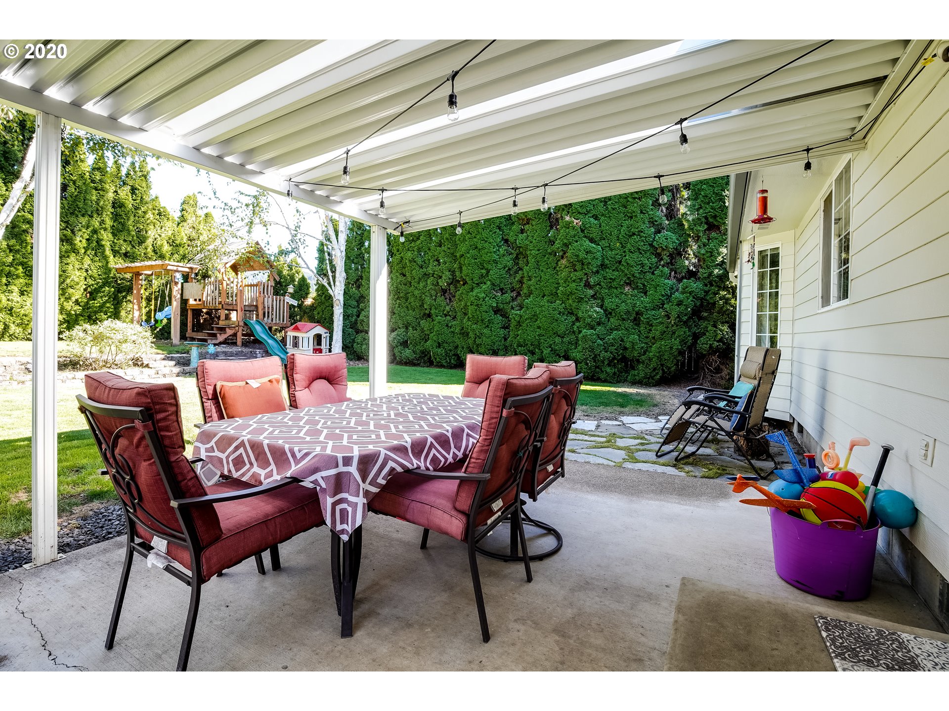 591 68th Place Springfield, OR 97478 - Photo 23 of 31 a view of a chairs and table in the patio