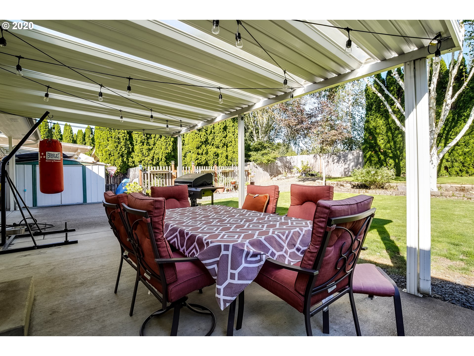 591 68th Place Springfield, OR 97478 - Photo 25 of 31 a view of a patio with a table and chairs