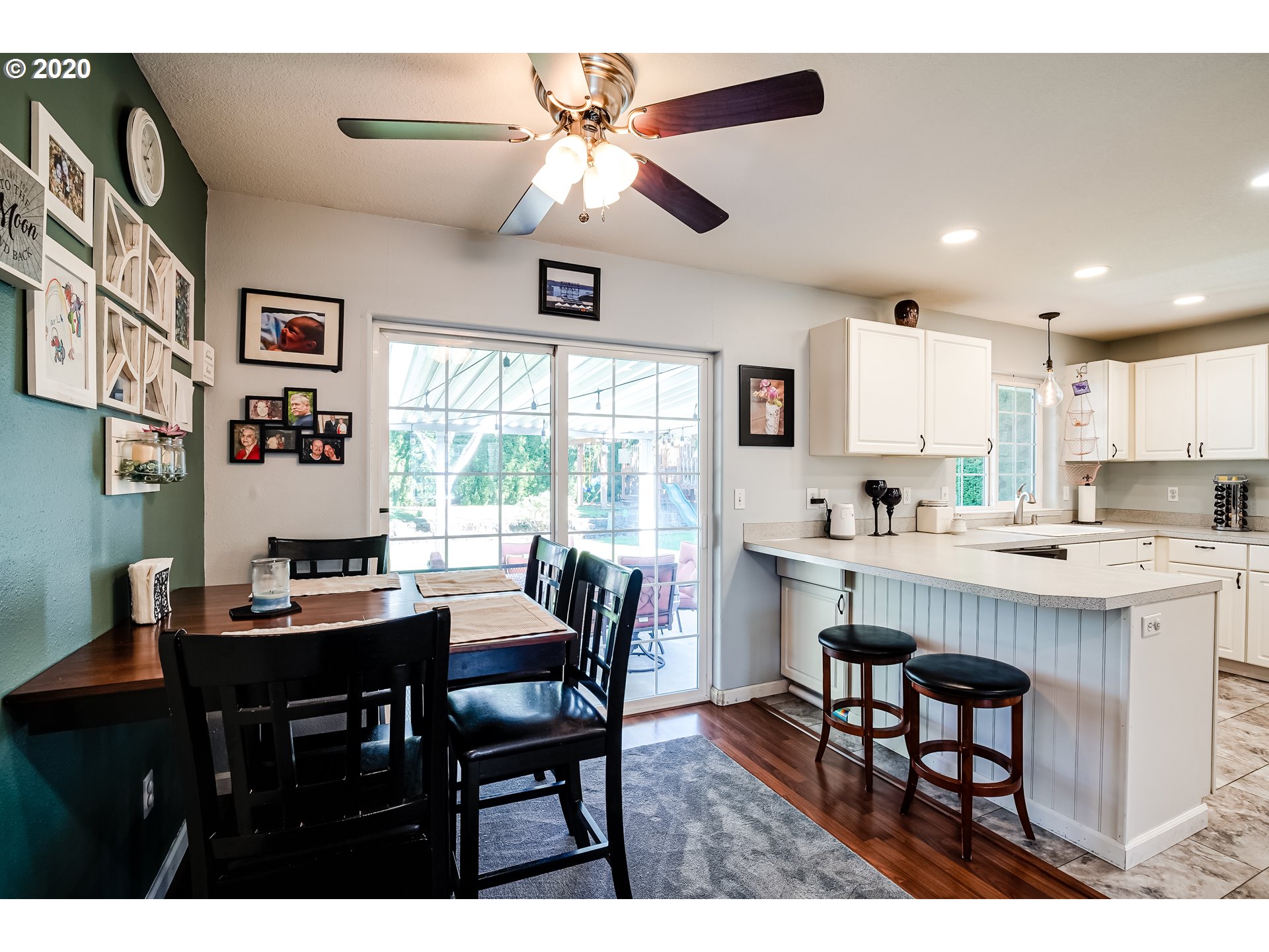 591 68th Place Springfield, OR 97478 - Photo 7 of 31 a view of a dining room with furniture window and outside view