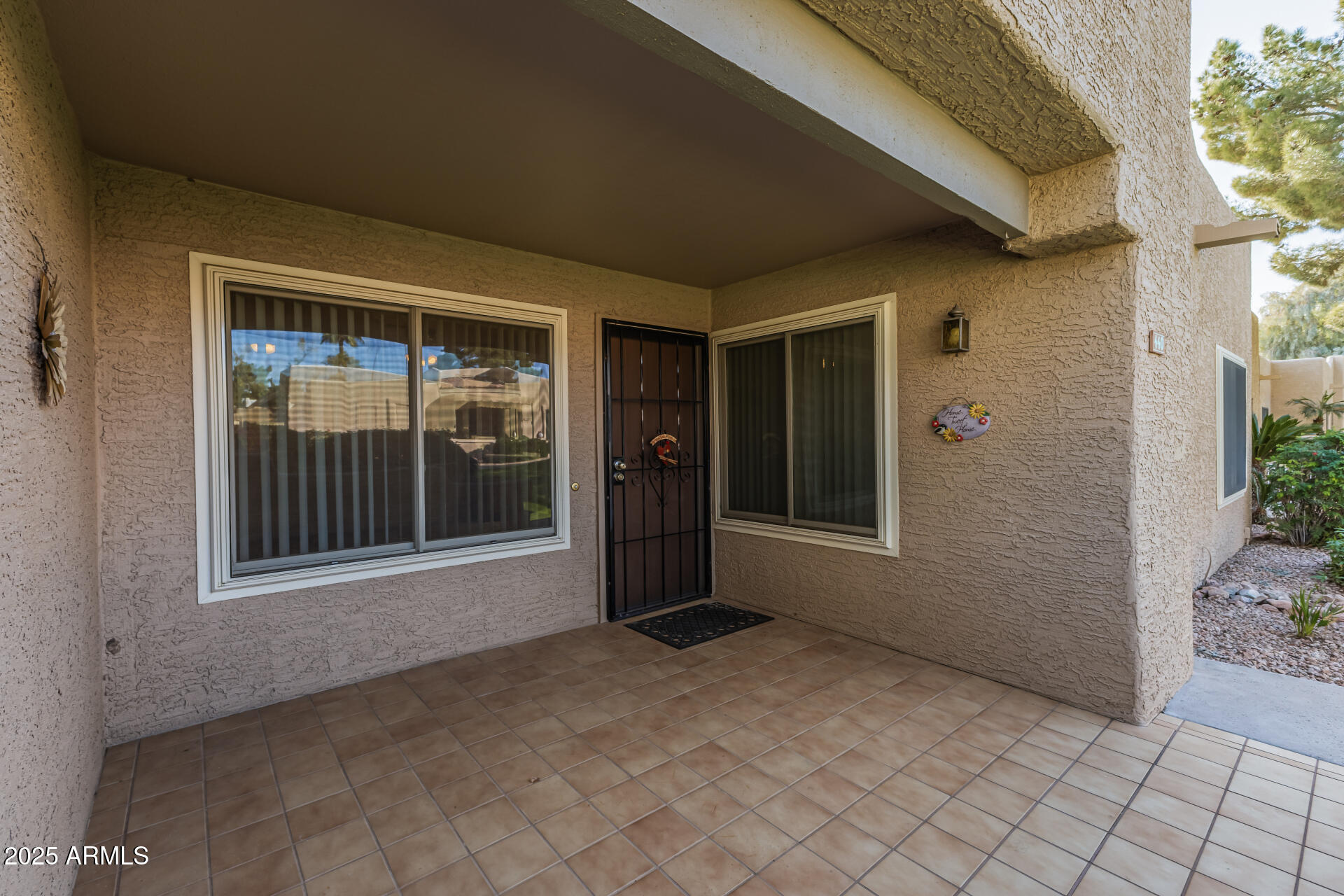 14300 West Bell Road, Unit 440 Surprise, AZ 85374 - Photo 5 of 40 a view of a big room with a large window and front door