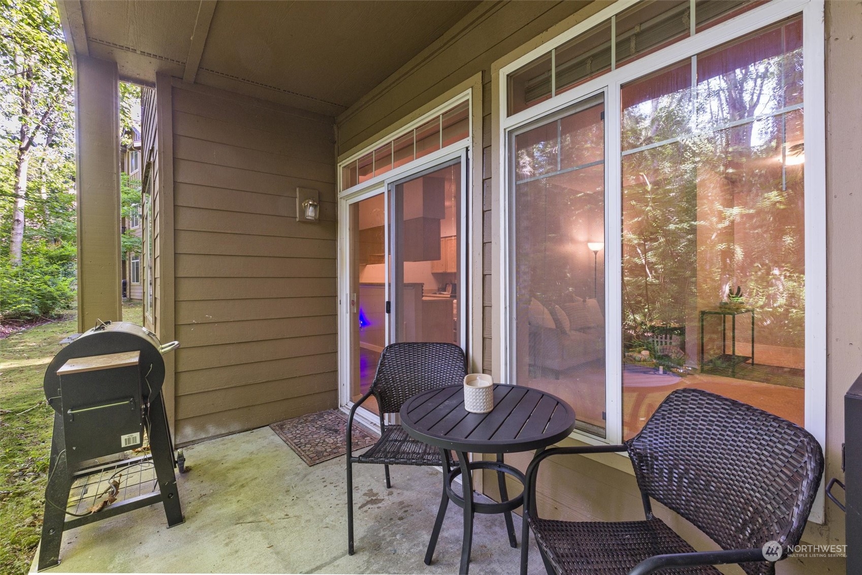 18930 Bothell Everett Highway, Unit C106 Bothell, WA 98012 - Photo 15 of 20 a living room with furniture and a window