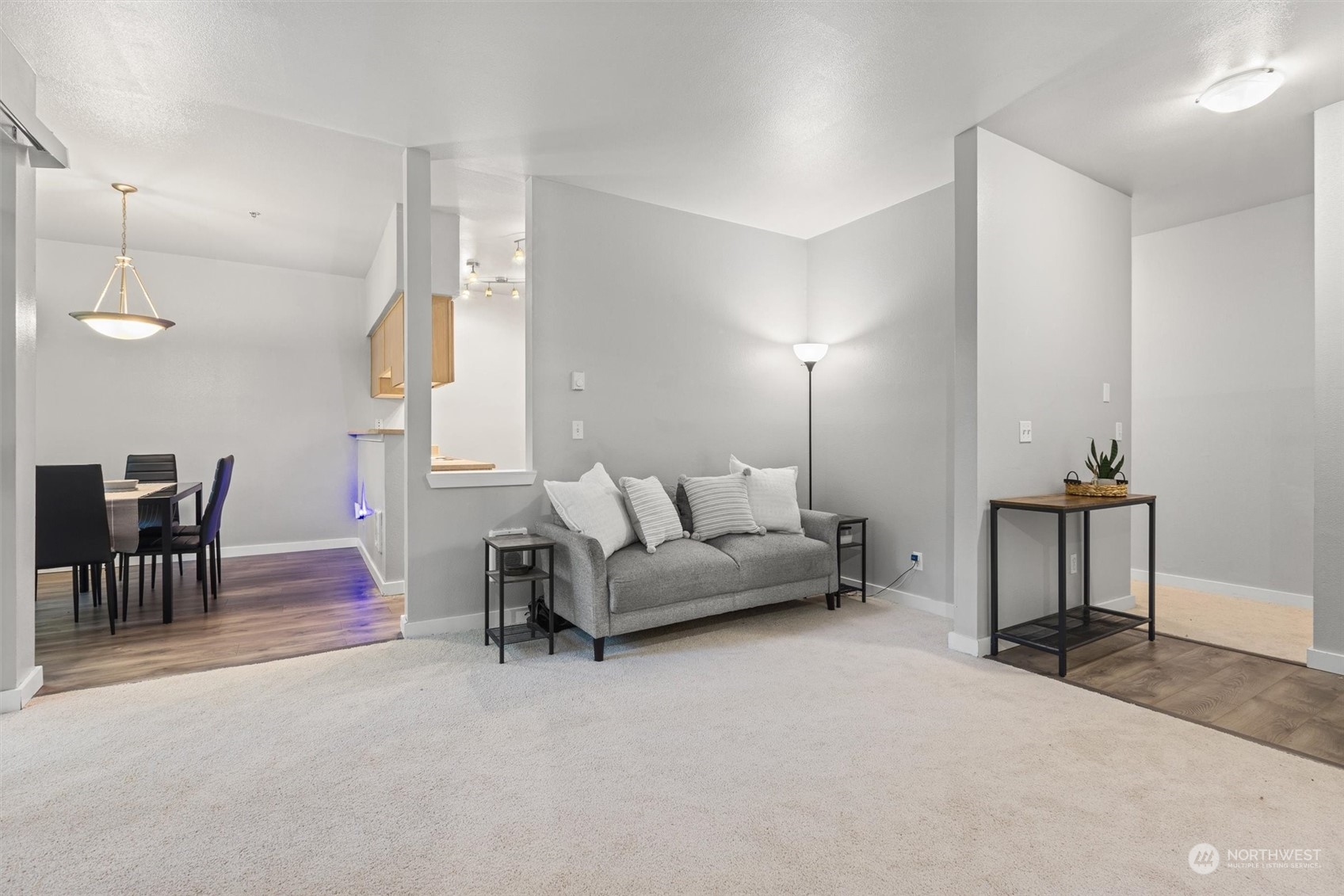 18930 Bothell Everett Highway, Unit C106 Bothell, WA 98012 - Photo 3 of 20 a living room with furniture and a table