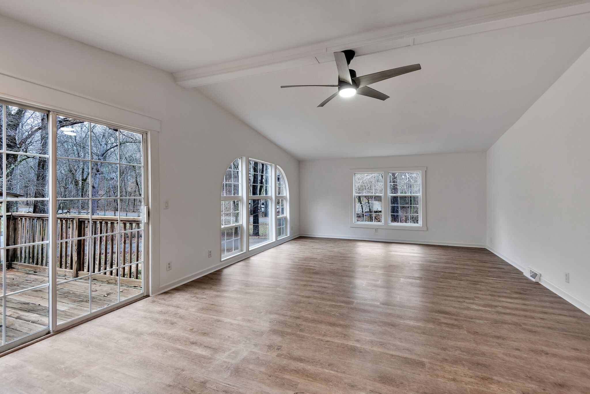 3063 Sweethome Road Chapmansboro, TN 37035 - Photo 16 of 55 a view of an empty room with wooden floor and a window