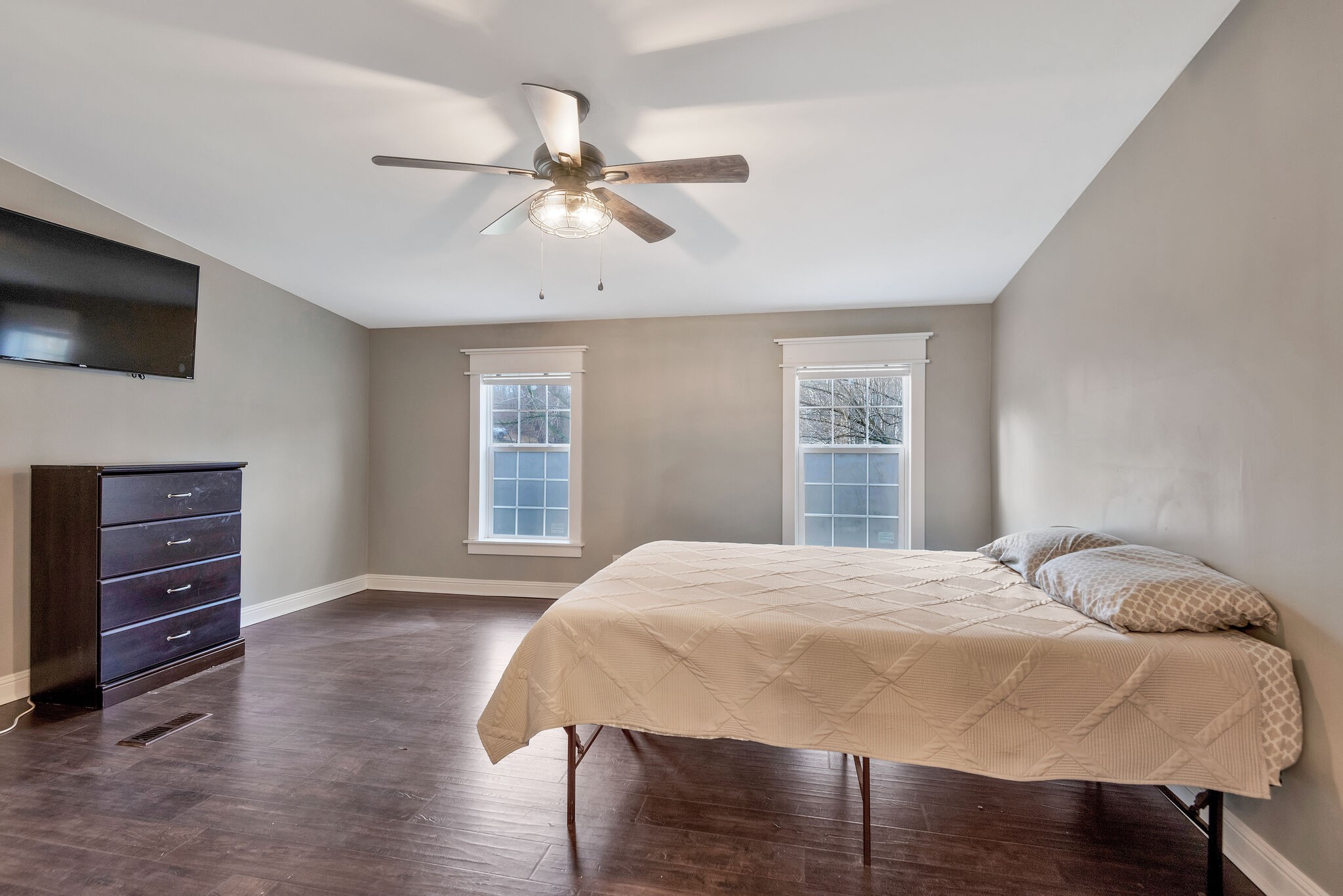 3063 Sweethome Road Chapmansboro, TN 37035 - Photo 17 of 55 a bedroom with a bed and a flat screen tv