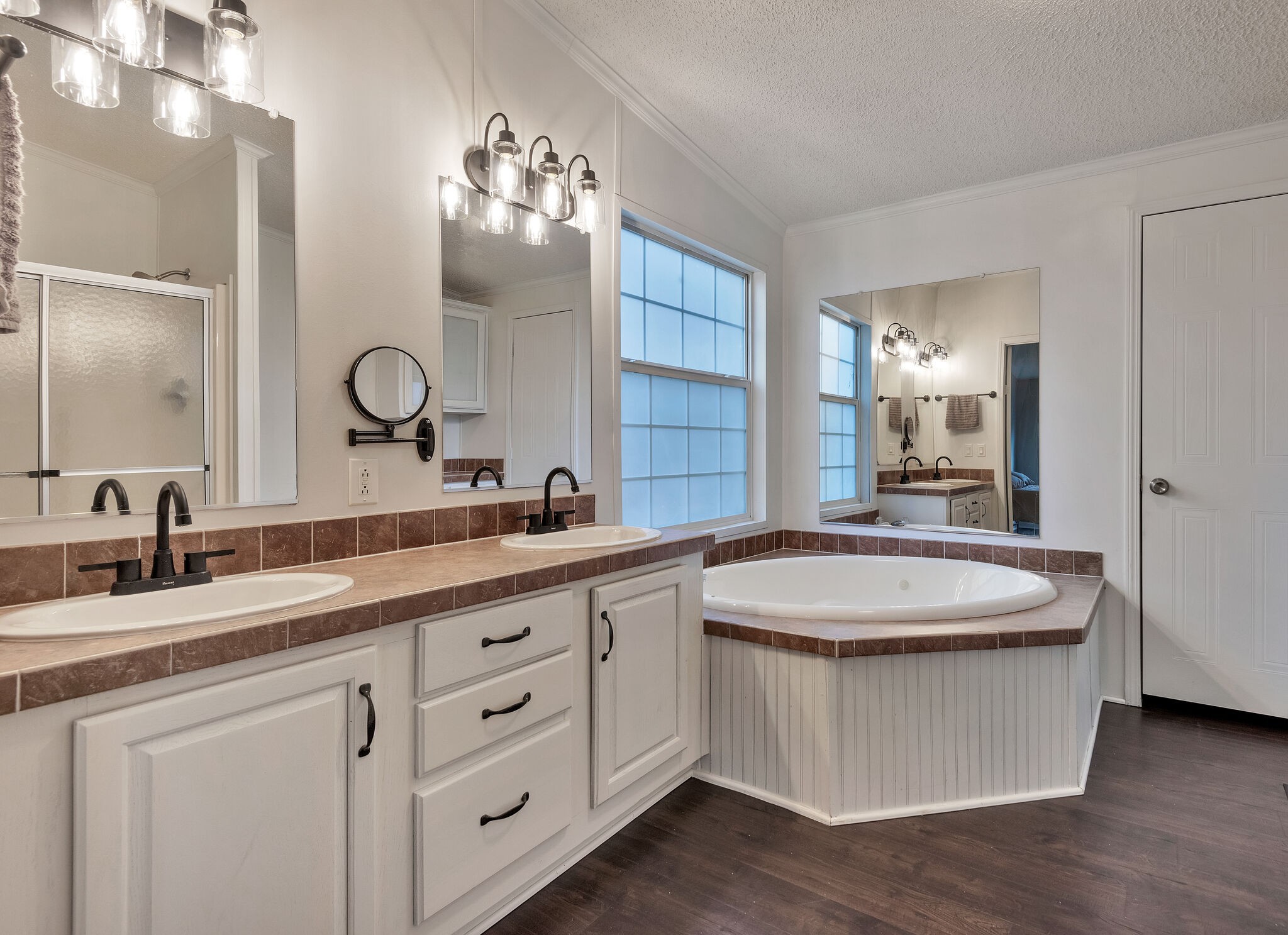 3063 Sweethome Road Chapmansboro, TN 37035 - Photo 20 of 55 a bathroom with a granite countertop sink a large mirror and a