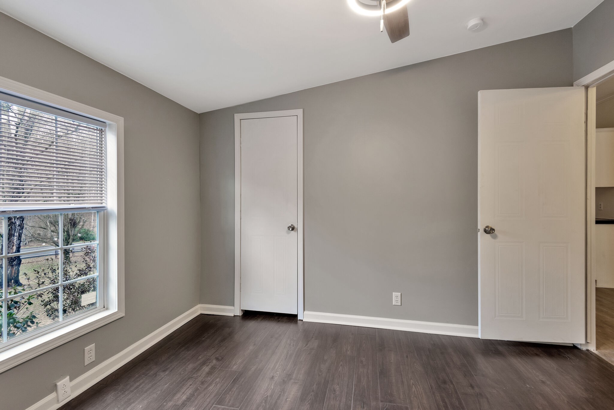 3063 Sweethome Road Chapmansboro, TN 37035 - Photo 24 of 55 a view of an empty room with window and wooden floor