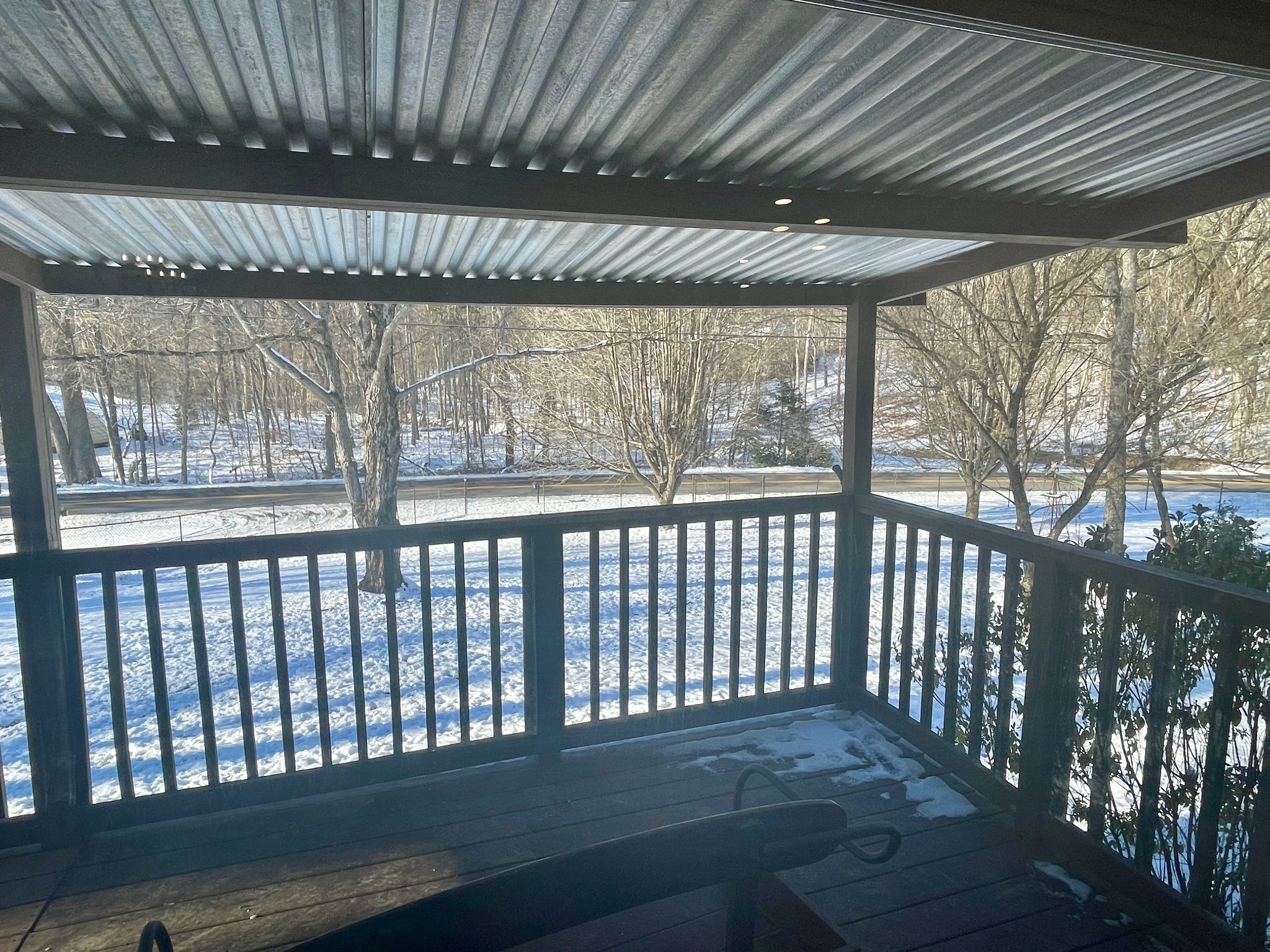 3063 Sweethome Road Chapmansboro, TN 37035 - Photo 33 of 55 a porch with a bench in front of a house