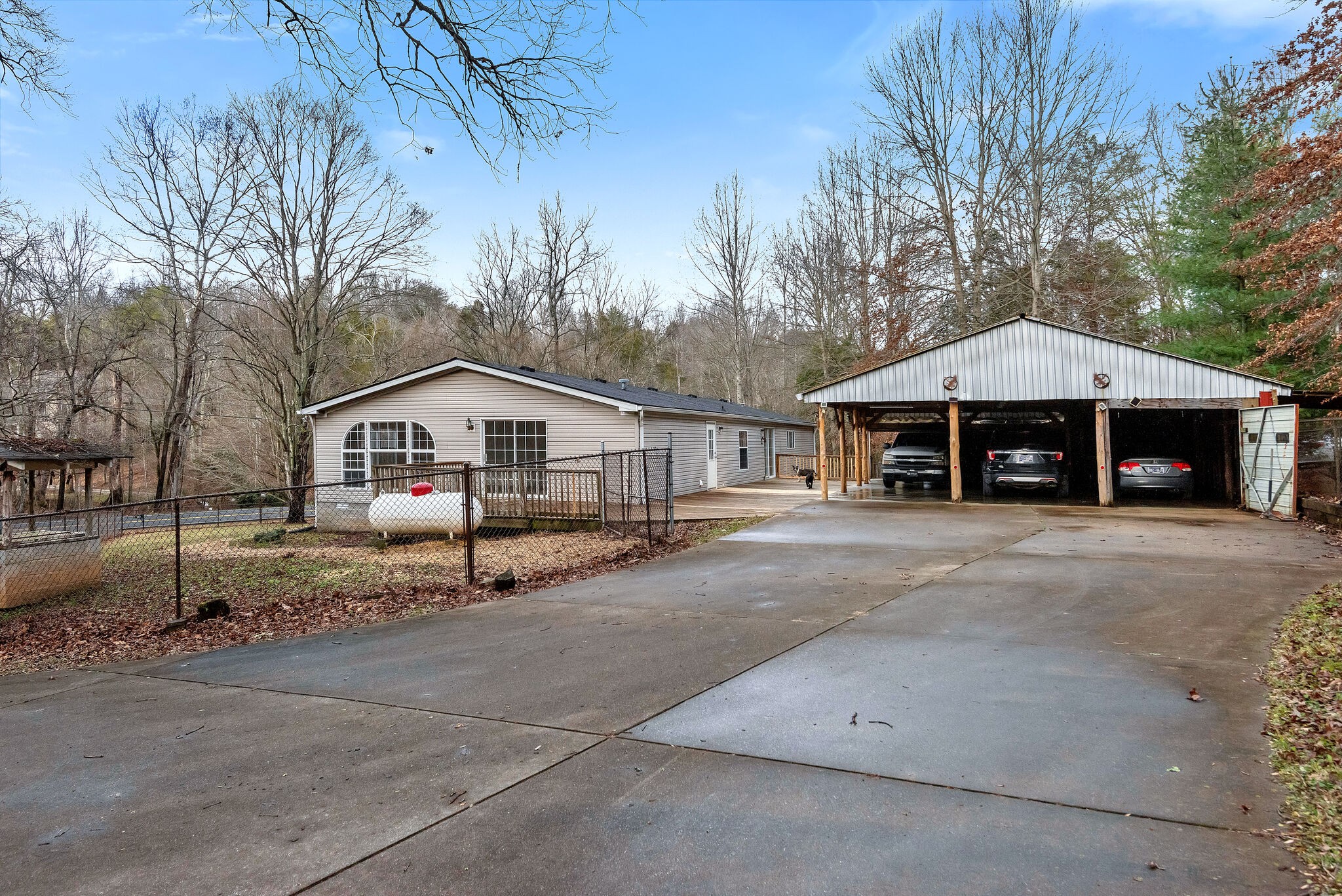 3063 Sweethome Road Chapmansboro, TN 37035 - Photo 36 of 55 a front view of a house with a yard and garage