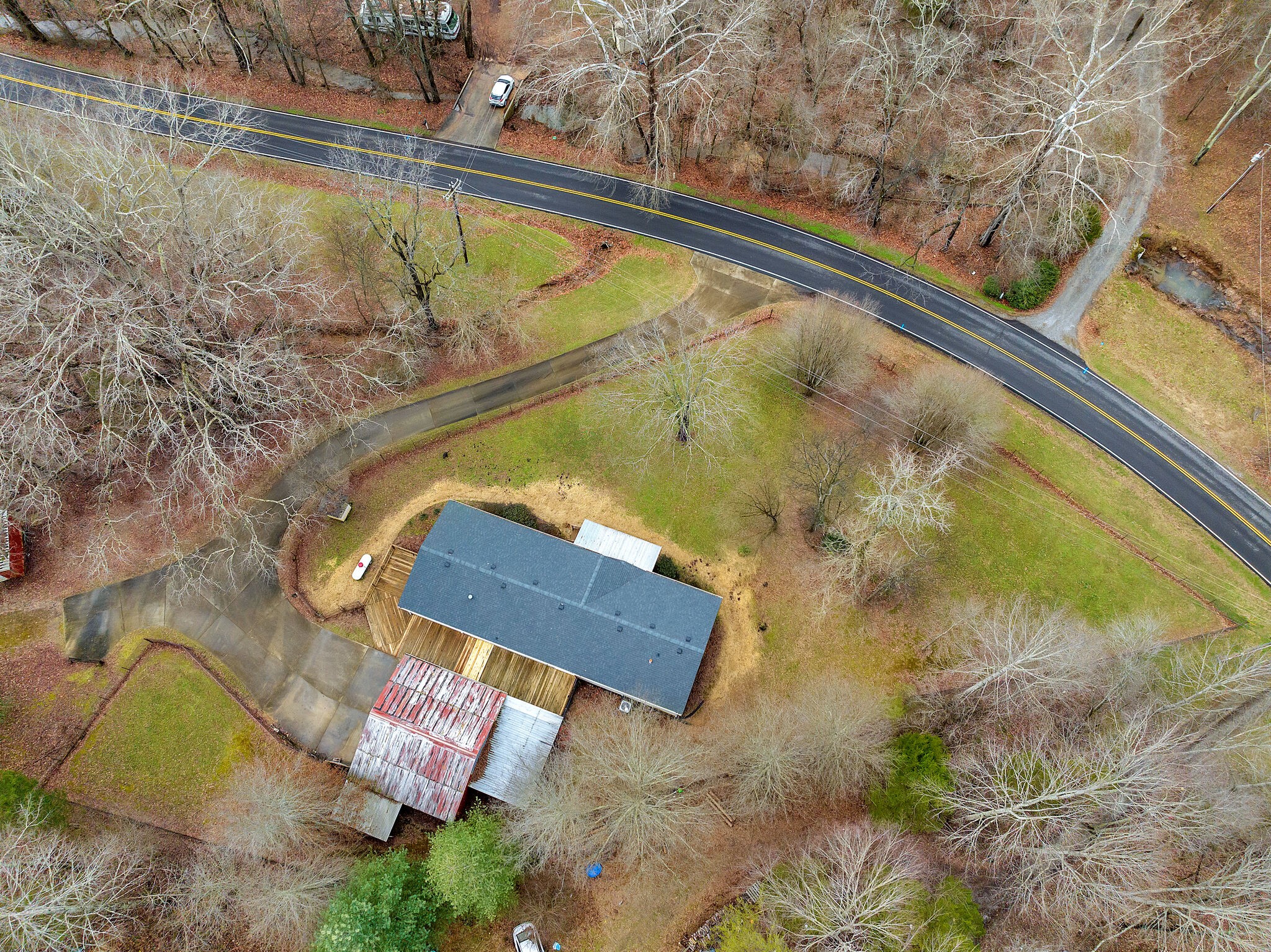 3063 Sweethome Road Chapmansboro, TN 37035 - Photo 44 of 55 a view of swimming pool with a yard and sitting area