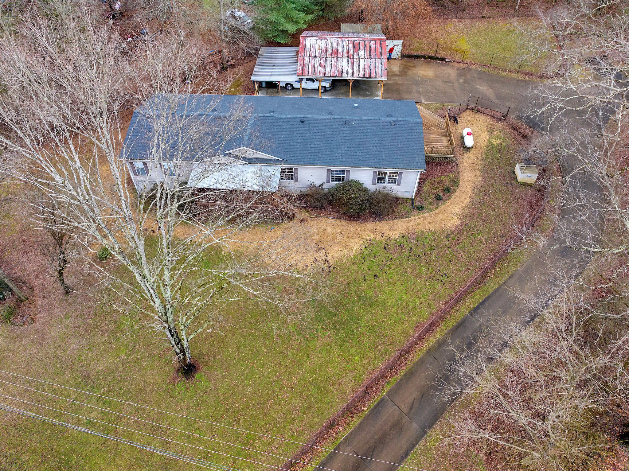 3063 Sweethome Road Chapmansboro, TN 37035 - Photo 54 of 55 a view of a house with a yard
