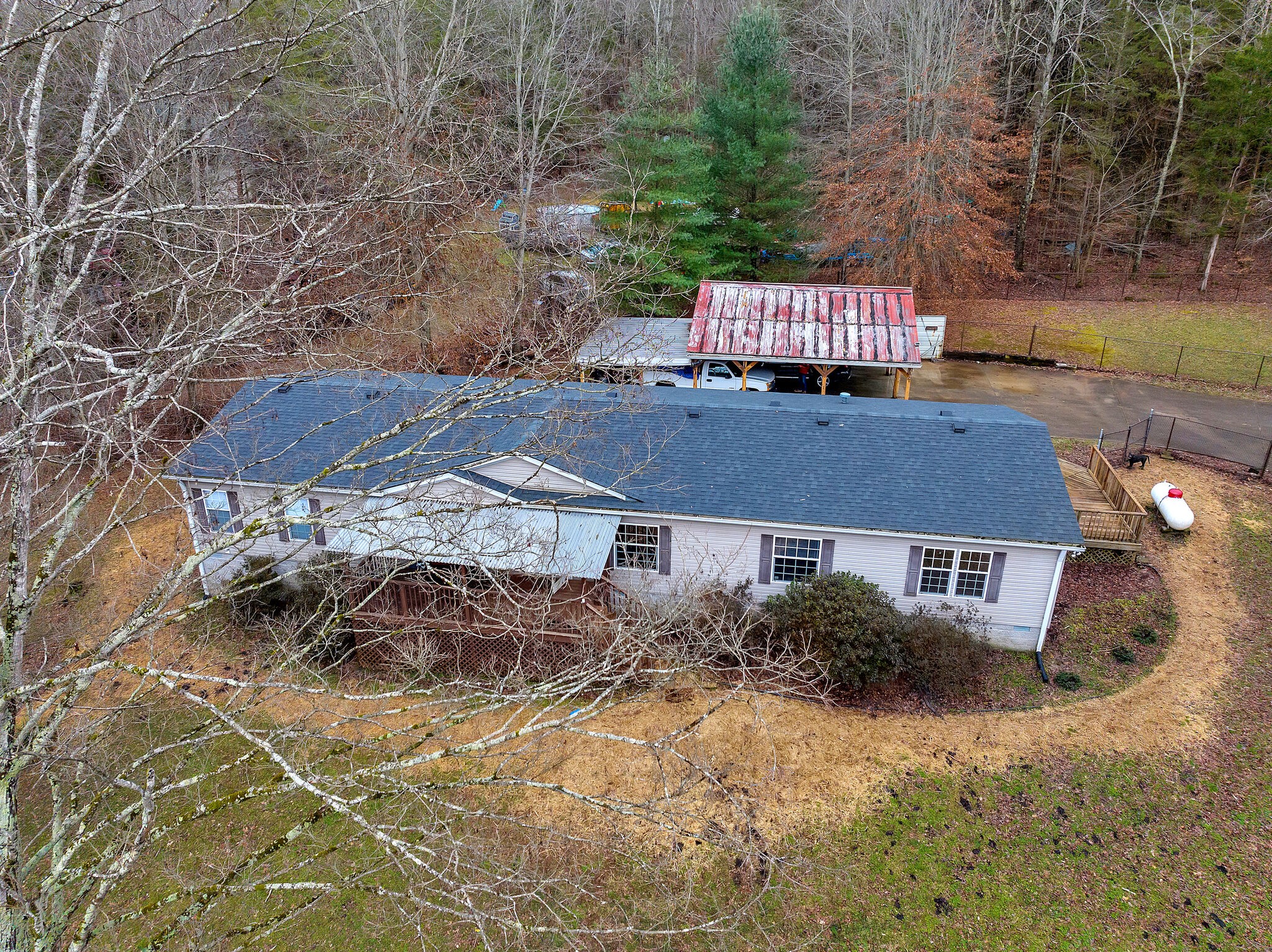 3063 Sweethome Road Chapmansboro, TN 37035 - Photo 55 of 55 a view of a house with a yard