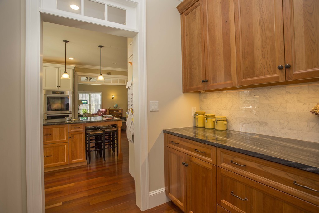 70 Deerfield Road Needham, MA 02492 - Photo 8 of 19 a kitchen with a sink and cabinets