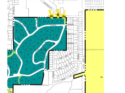 a view of a swimming pool with a balcony