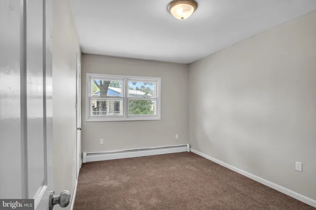 an empty room with an entryway