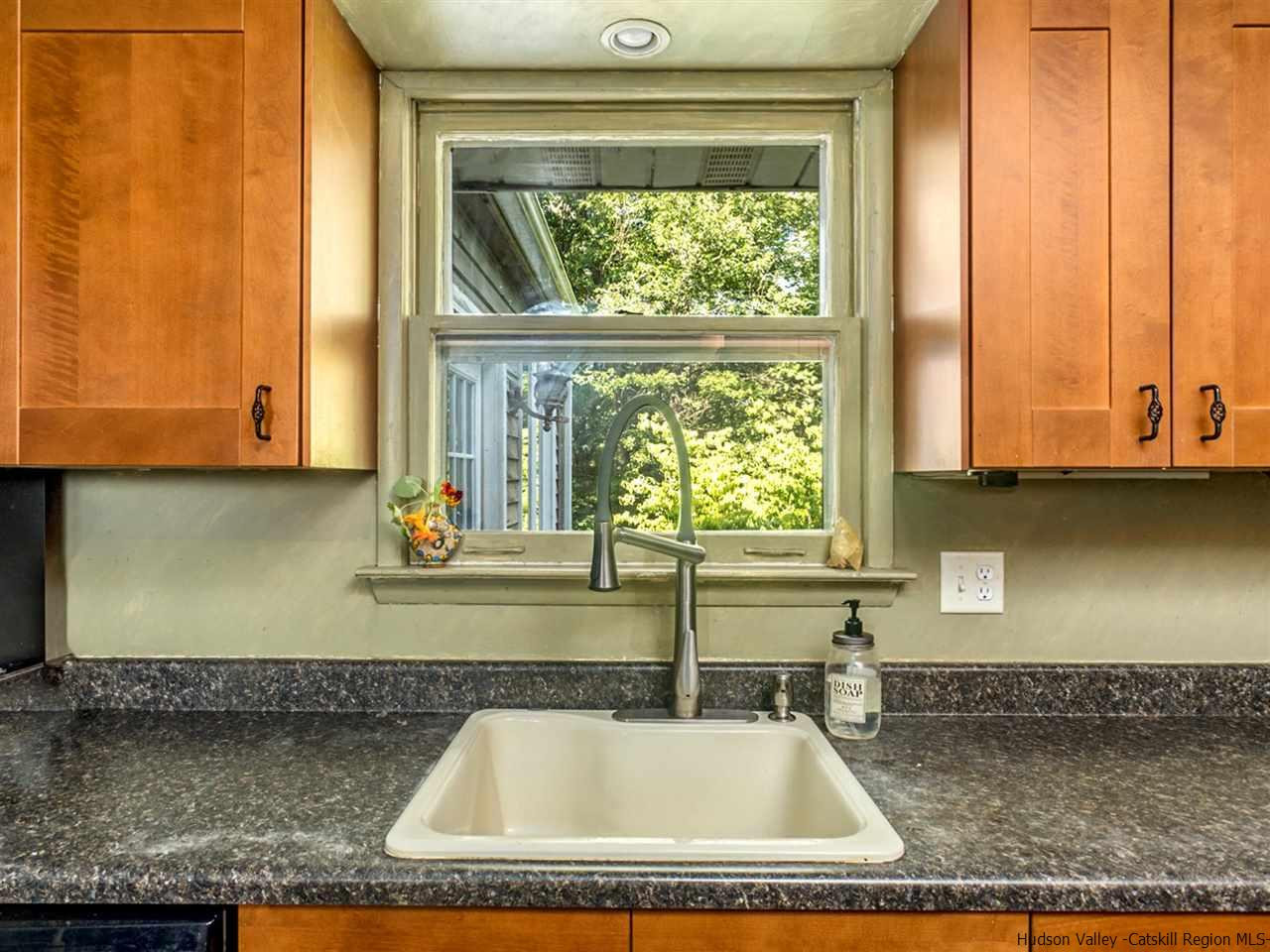 33 Alan Street Stone Ridge, NY 12484 - Photo 8 of 25 a kitchen with a window a sink and a stove