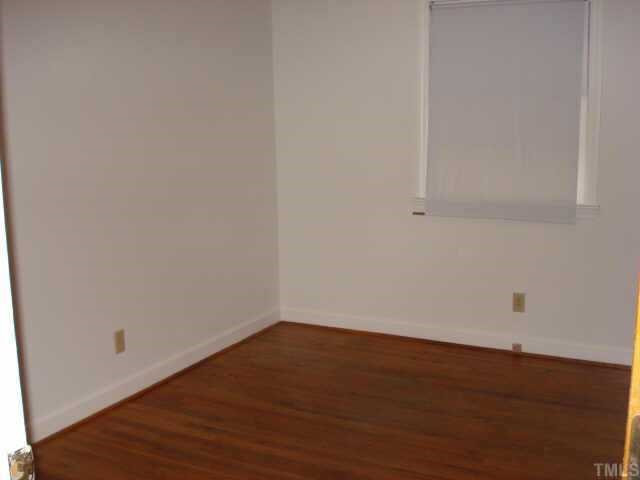 408 Sunnyview Road Henderson, NC 27536 - Photo 7 of 9 one of three bedrooms with hardwood floors Other