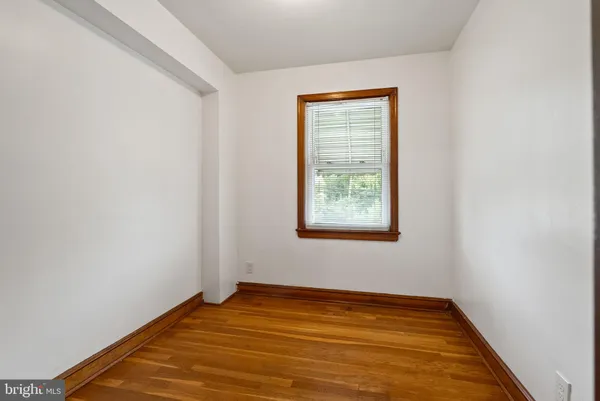 an empty room with window