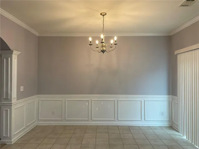 a view of a livingroom with chandelier