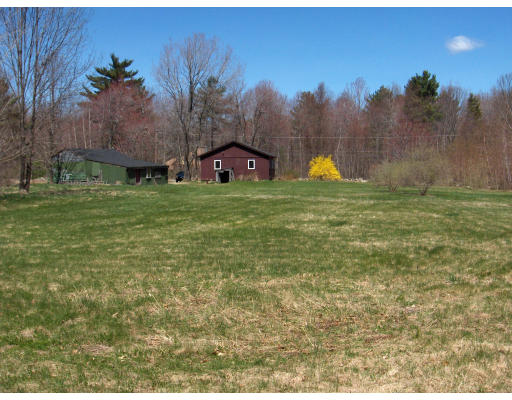 46 Paradise Lake Road Monson, MA 01057 - Photo 10 of 10 a view of a big yard with a house in the background