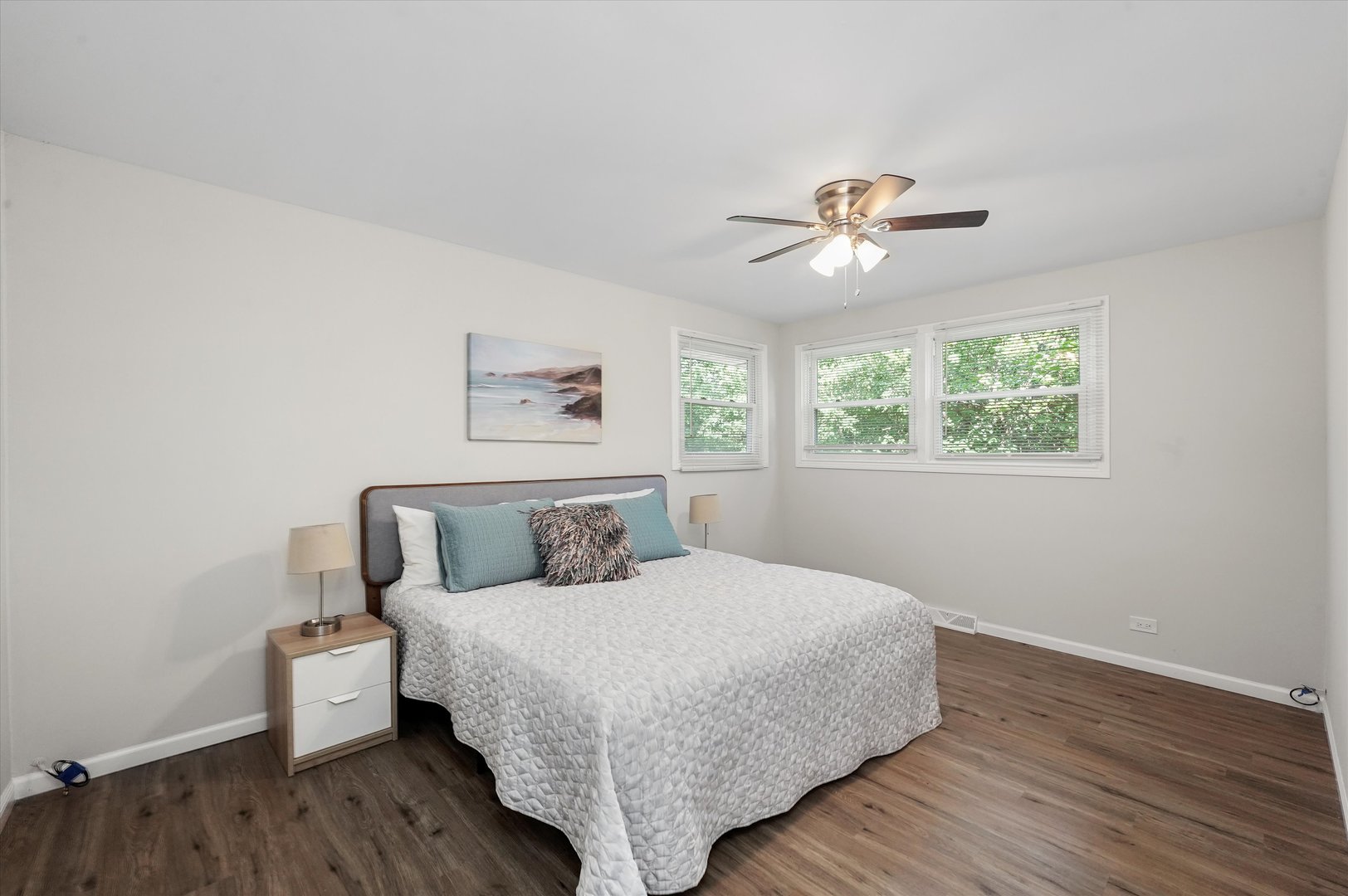 3508 Maple Lane Hazel Crest, IL 60429 - Photo 14 of 34 a bedroom with a bed and a chandelier