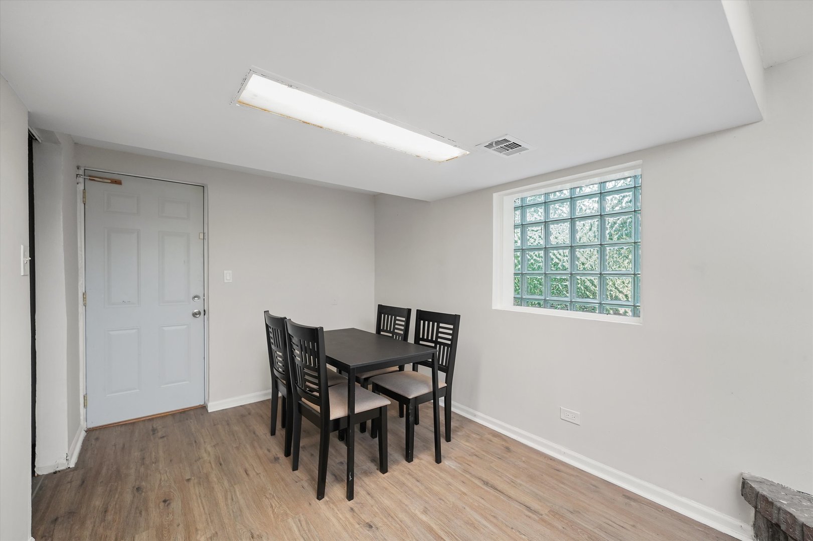 3508 Maple Lane Hazel Crest, IL 60429 - Photo 22 of 34 a view of a dining room with furniture and wooden floor