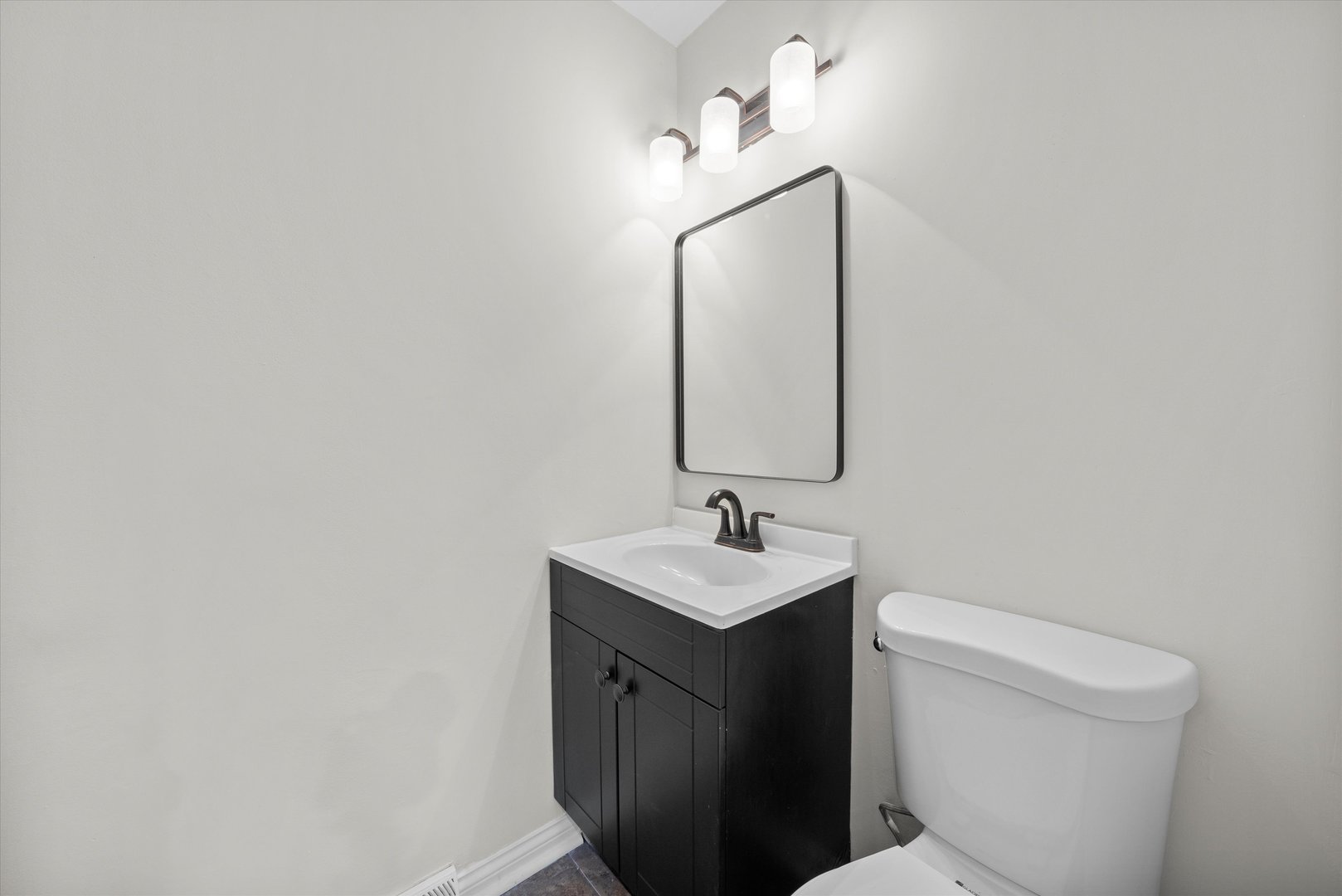 3508 Maple Lane Hazel Crest, IL 60429 - Photo 23 of 34 a bathroom with a toilet sink and mirror