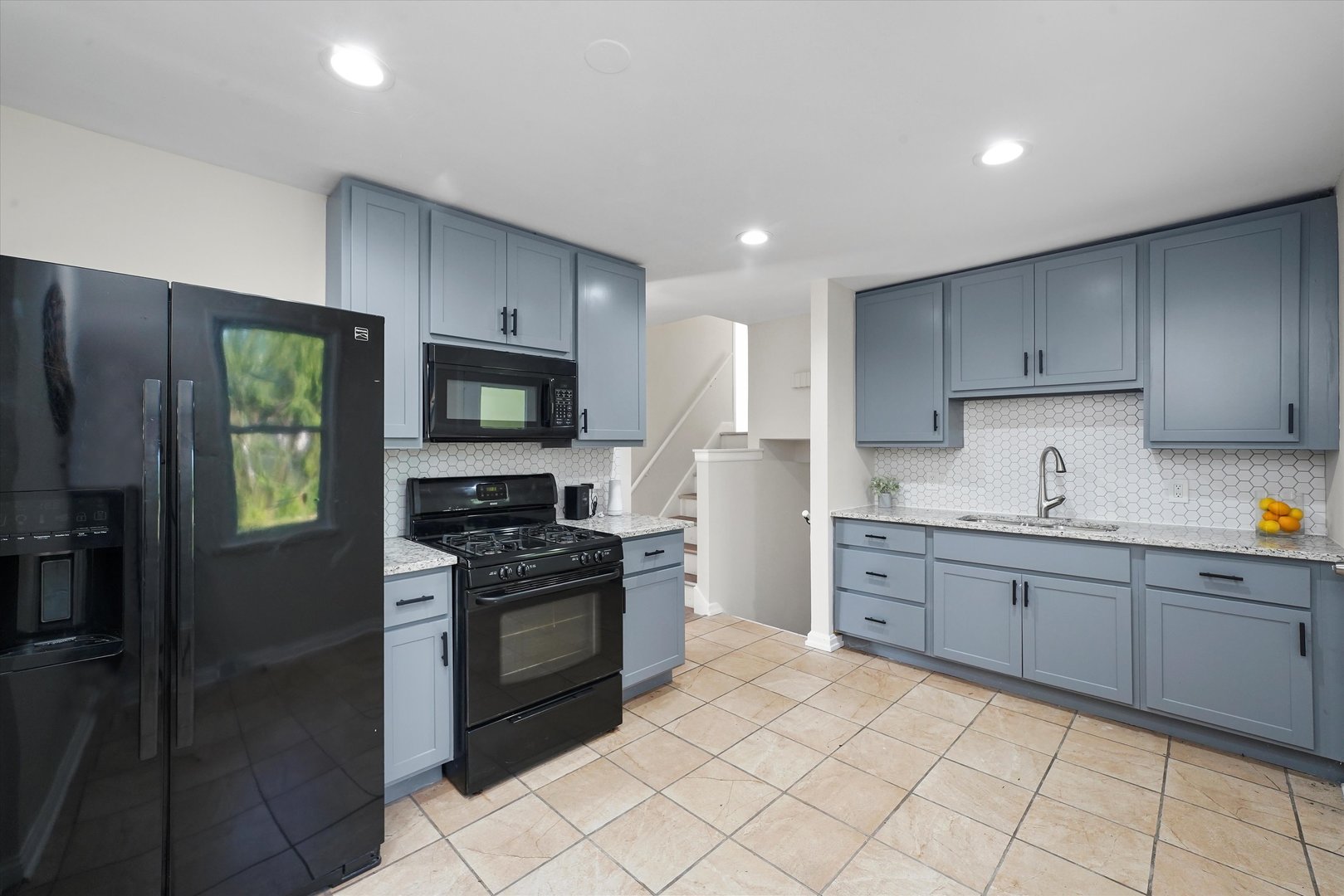 3508 Maple Lane Hazel Crest, IL 60429 - Photo 9 of 34 a kitchen with granite countertop cabinets stainless steel appliances and a sink