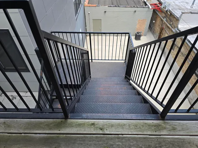 a balcony with wooden floor